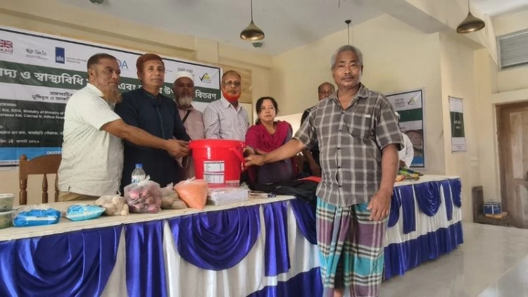 বাঘাইছড়িতে বন্যায় ক্ষতিগ্রস্ত পরিবারের মাঝে সহায়তা বিতরণ